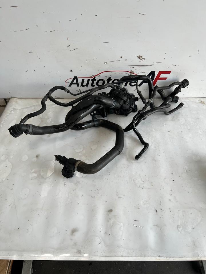 VW Golf 7 VII Wasserpumpe Kühlmittelpumpe 04E121042