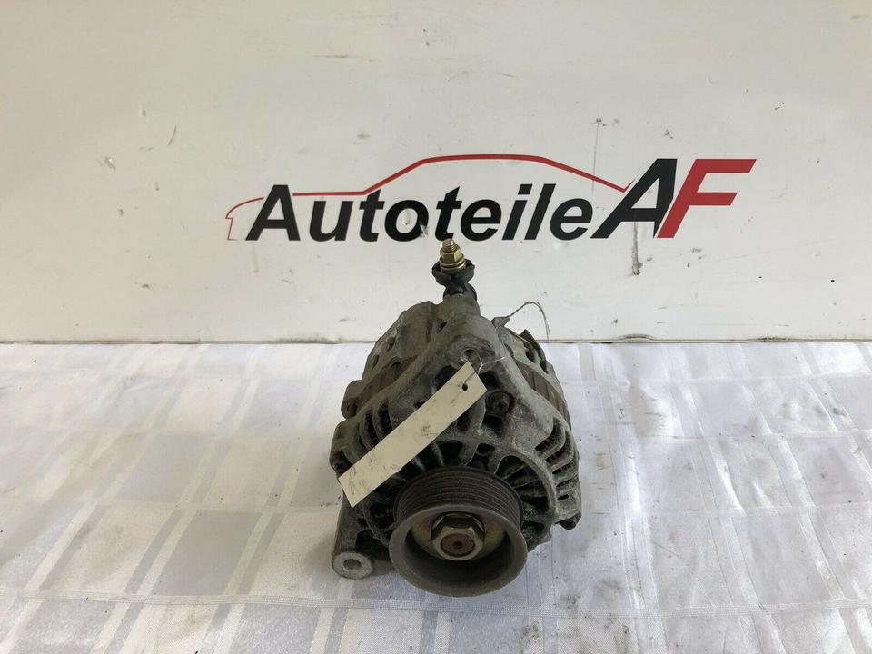 Nissan Almera Tino Primera 2.0 Lichtmaschine 231004M611 A2TB3891